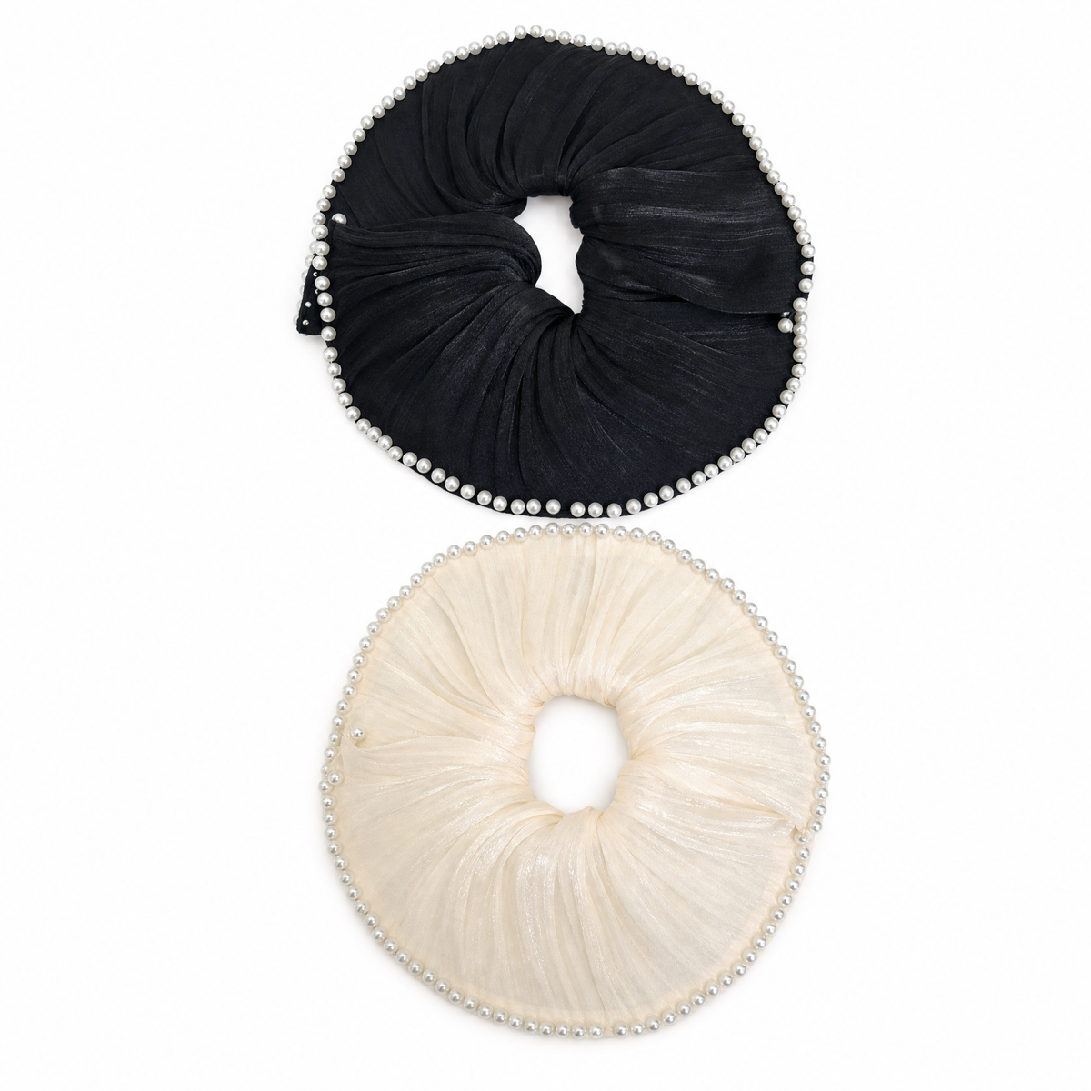 Parisian pearl scrunchie set featuring black and white satin hair ties with pearl embellishments