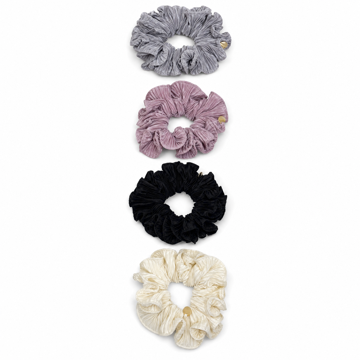 Four satin hair scrunchies in dove grey, plum, black, and cream color