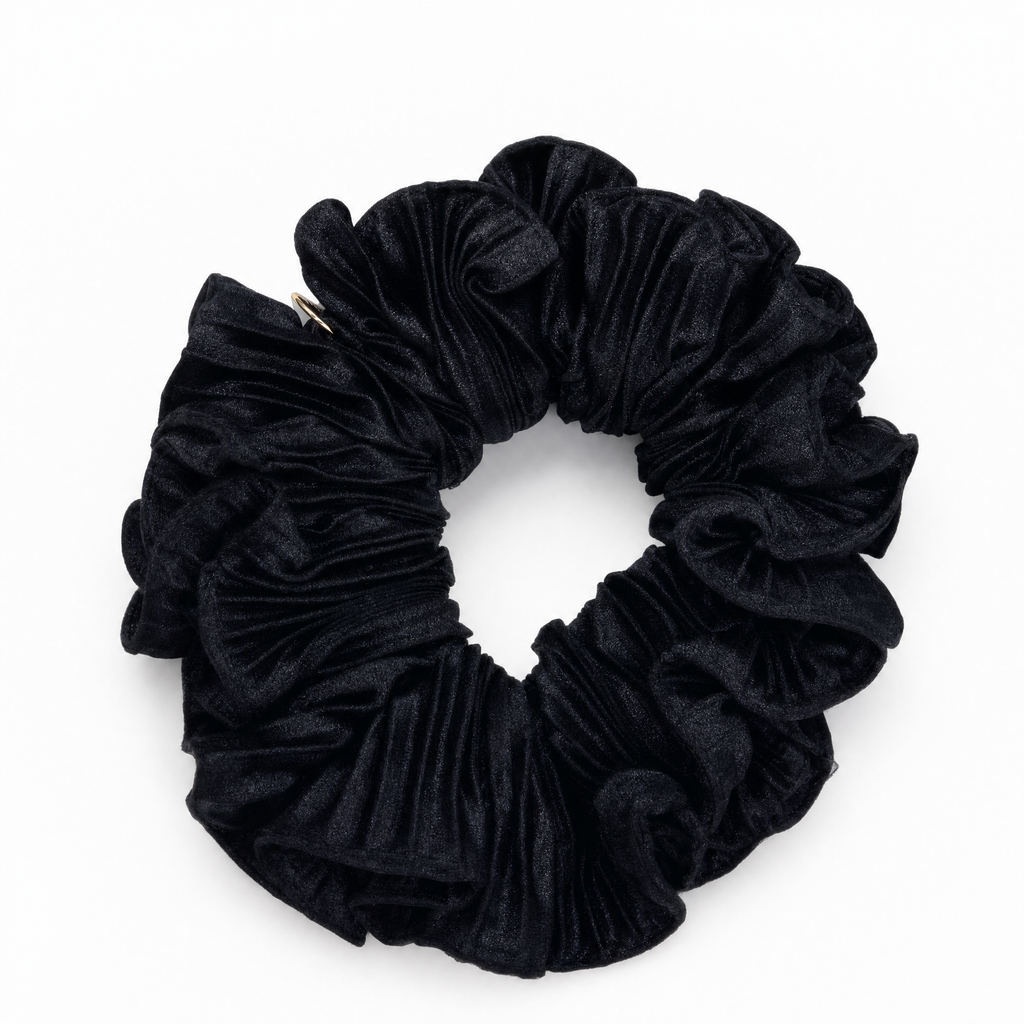 Sleek black silky satin scrunchie designed for damage-free everyday styling on all hair types
