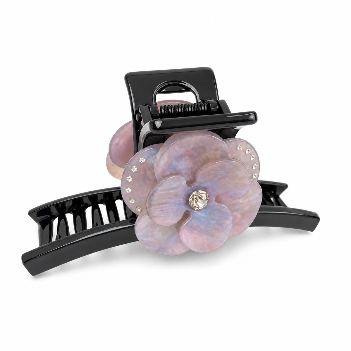 Side view of a large black acrylic claw clip showing the strong-hold teeth mechanism and pink camellia embellishment