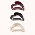 A set of three heart-shaped claw clips 