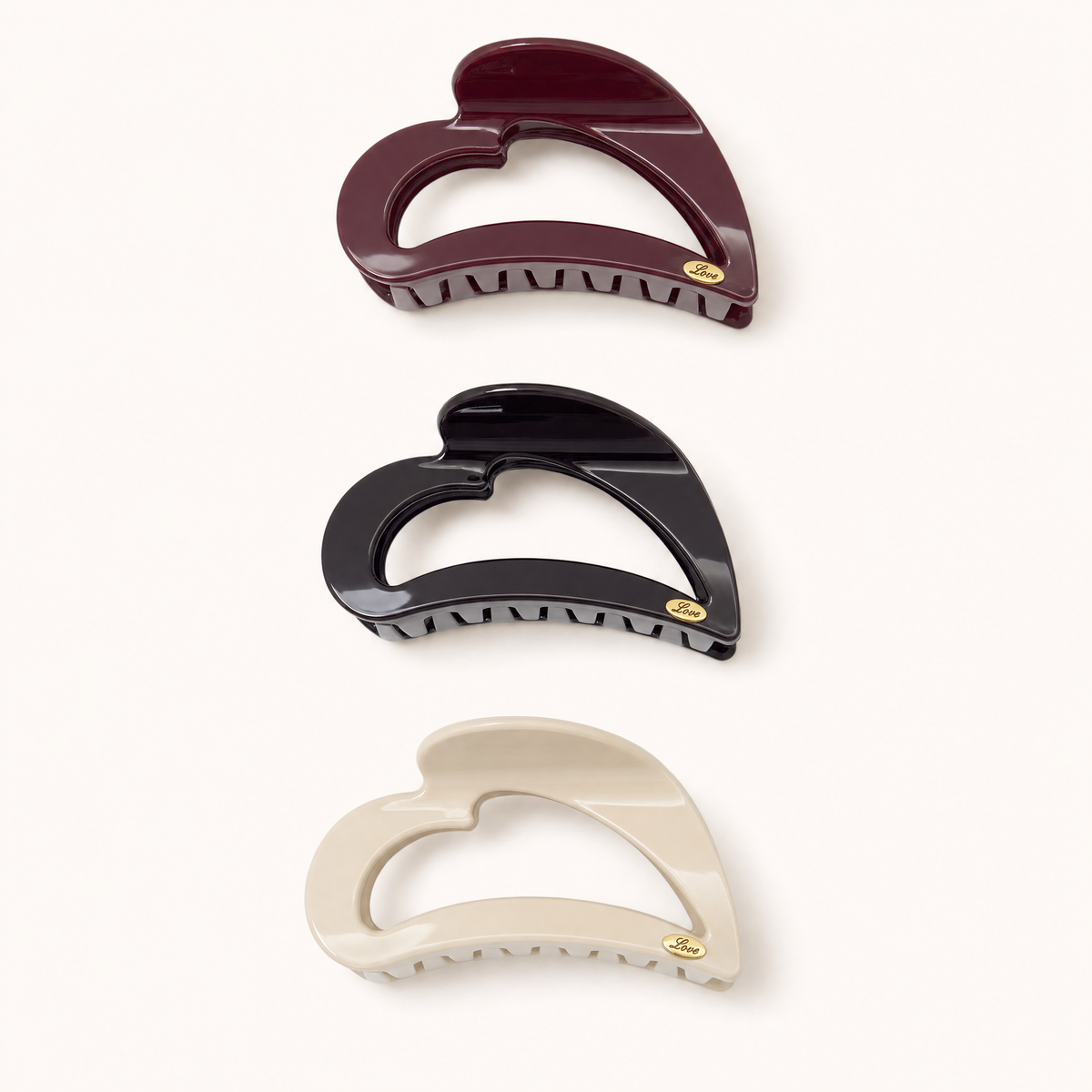 A set of three heart-shaped claw clips 
