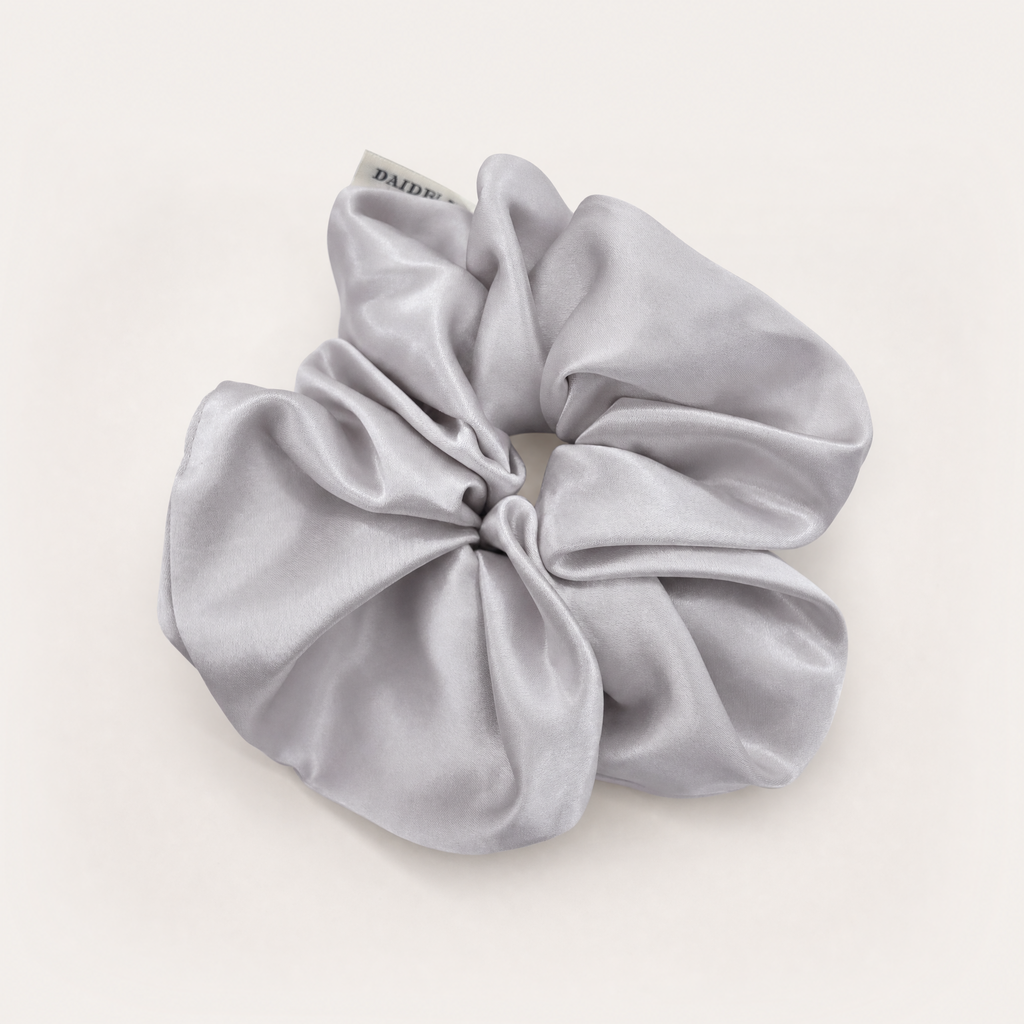 Light grey French silky hair scrunchie with smooth high-shine fabric