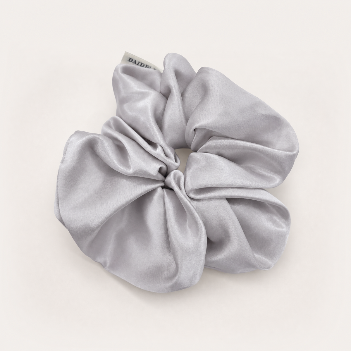 Light grey French silky hair scrunchie with smooth high-shine fabric
